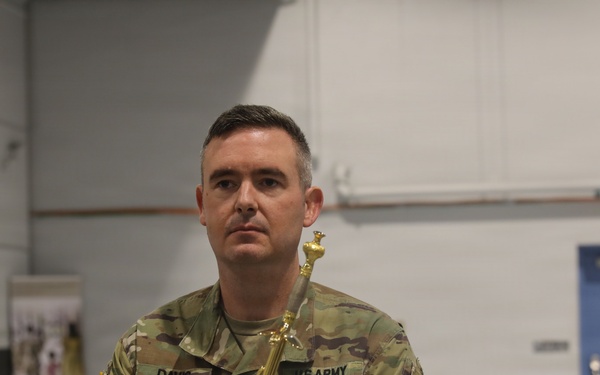 Command Sgt. Maj. Benjamin Davis takes responsibility for the 58th Expeditionary Military Intelligence Brigade