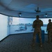 Airmen of the 139th Security Forces Squadron train with firearms simulator