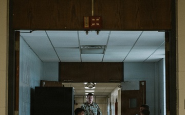 Airmen of the 139th Security Forces Squadron train with firearms simulator