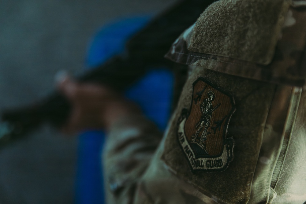 Airmen of the 139th Security Forces Squadron train with firearms simulator