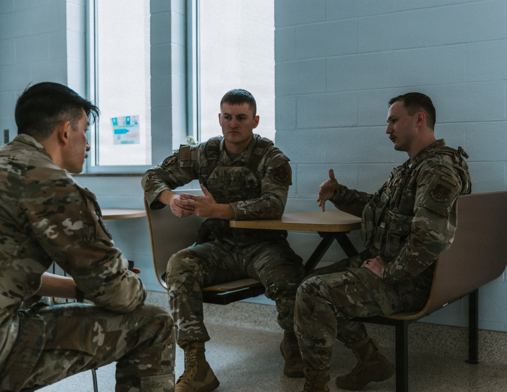 Airmen of the 139th Security Forces Squadron train with firearms simulator