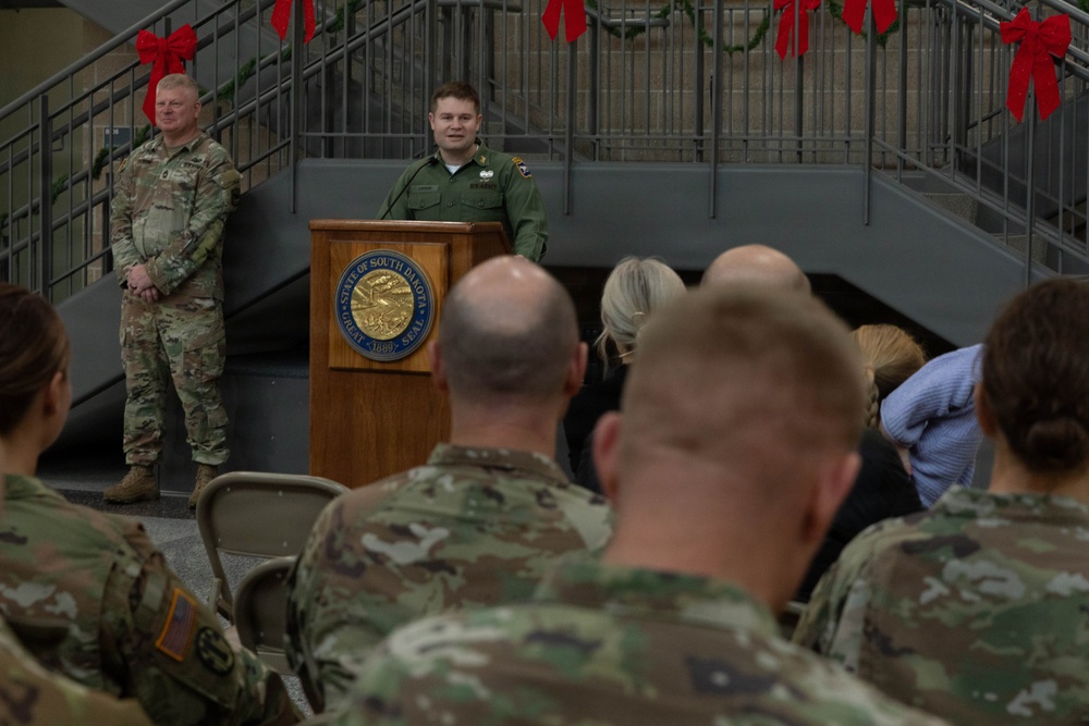 Army Maj. Wears Father's Utility Uniform During Promotion Ceremony