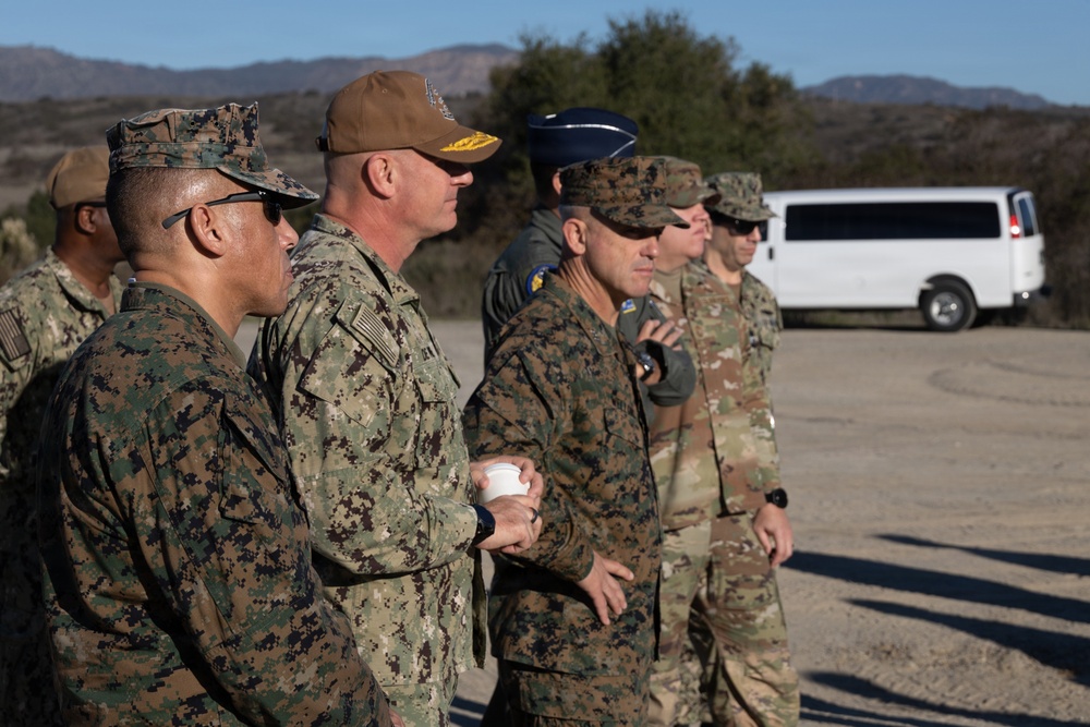 Distinguished visitors survey Steel Knight 25 operations