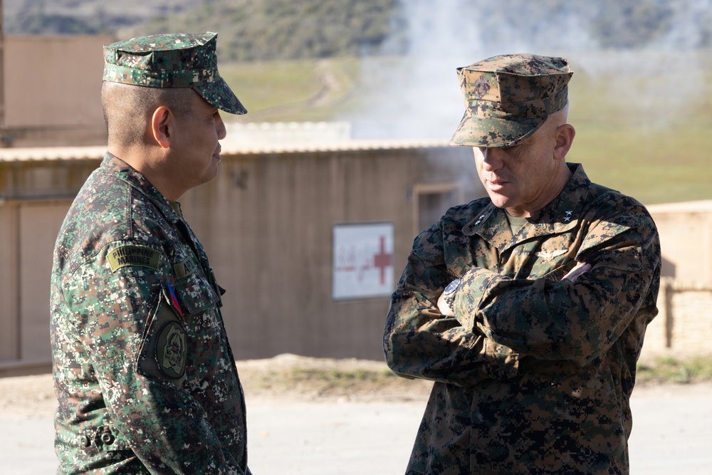 Distinguished visitors survey Steel Knight 25 operations