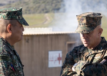 Distinguished visitors survey Steel Knight 25 operations