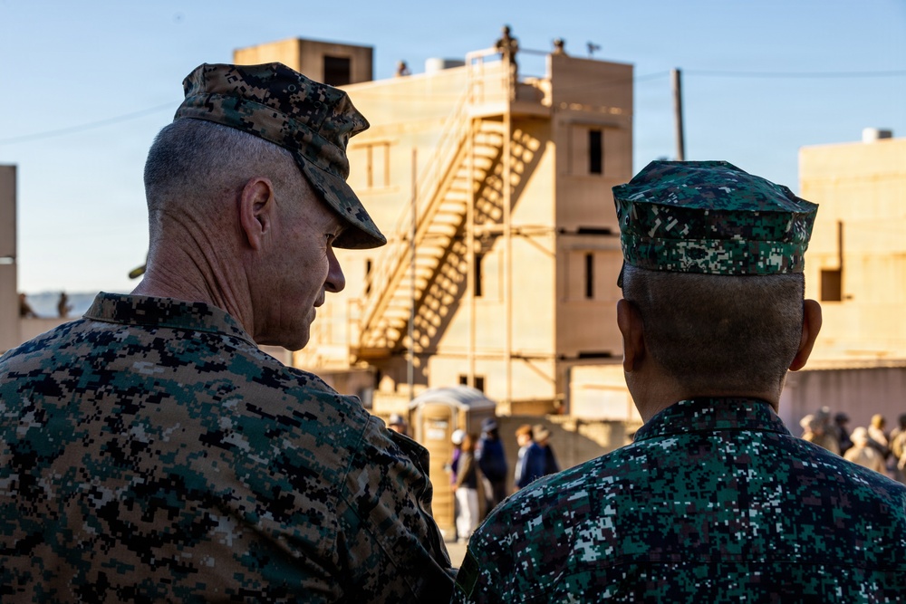 Distinguished visitors survey Steel Knight 25 operations