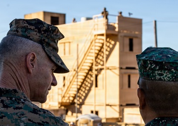 Distinguished visitors survey Steel Knight 25 operations