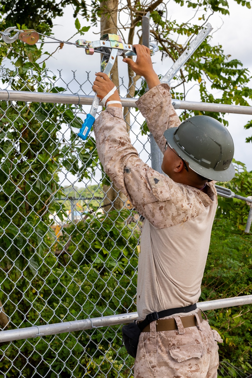 NMCB 133 Builds New Security Fence and Access Road