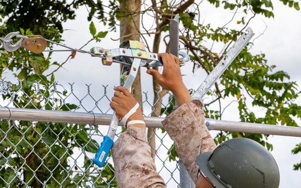 NMCB 133 Builds New Security Fence and Access Road