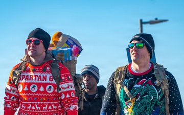 Ruckin’ around the Christmas tree: Camp Humphreys community carries in the holiday spirit with its annual Toy Ruck March