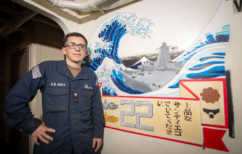 USS San Diego (LPD 22) Sailor Showcases Navy Heritage with Murals