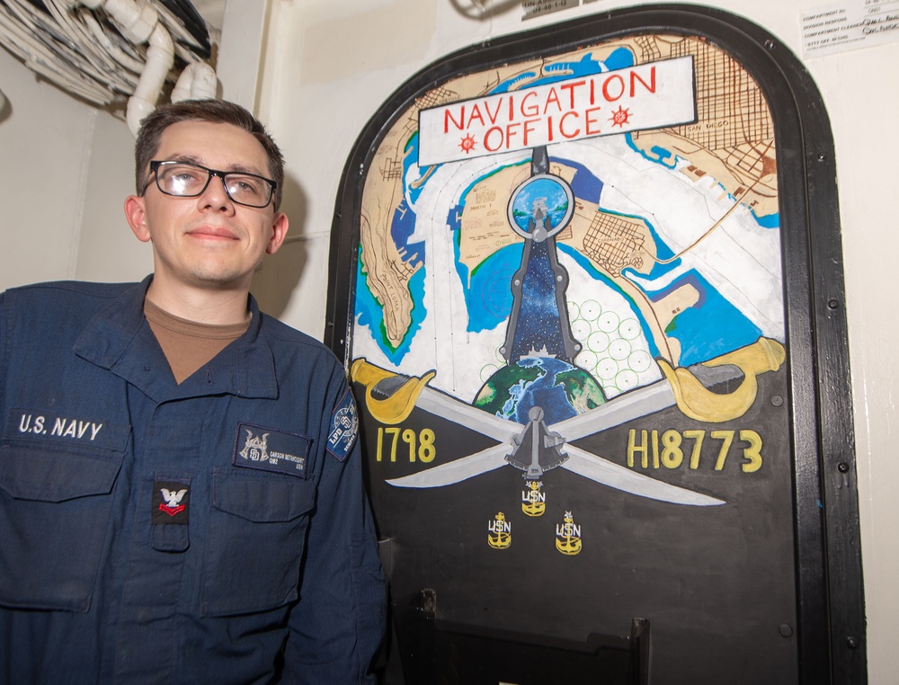 USS San Diego (LPD 22) Sailor Showcases Navy Heritage with Murals