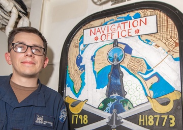 USS San Diego (LPD 22) Sailor Showcases Navy Heritage with Murals