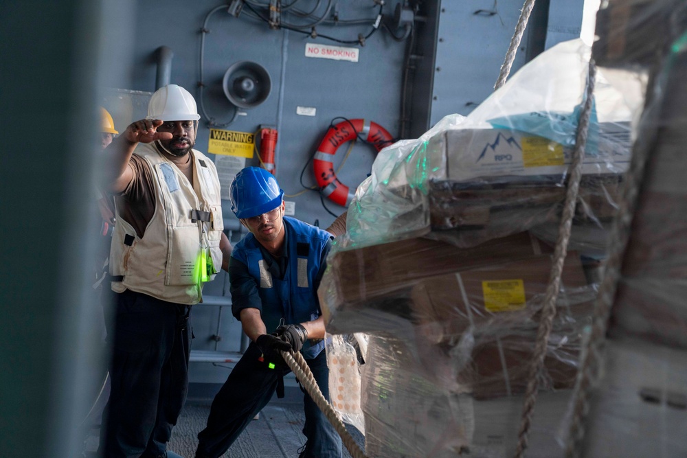 USS Tripoli Conducts Replenishment-At-Sea with USS Tippecanoe