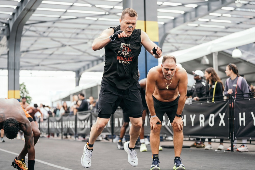 Petrusevic performing Burpee Broad Jumps