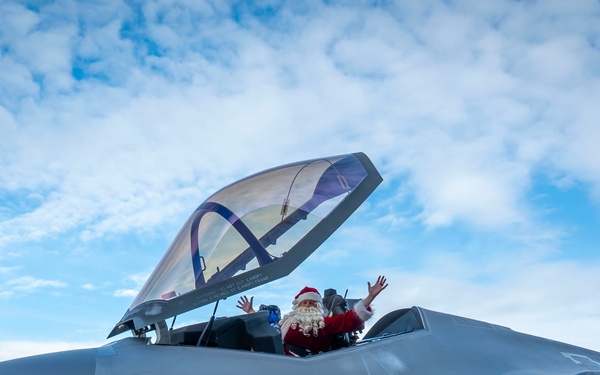 Santa arrives at 419th Family Holiday Party