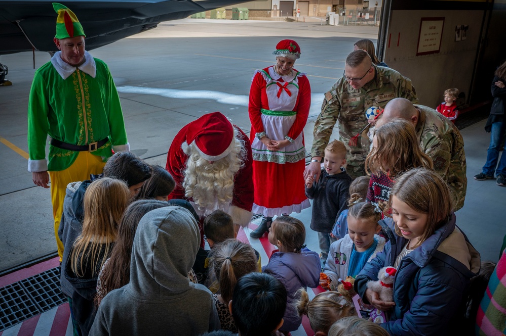 Santa arrives at 419th Family Holiday Party
