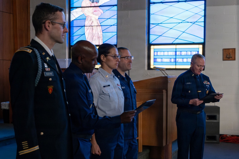 MST1 Alexandra Boehm, a reservist assigned to Sector New York, is meritoriously advanced during an all-hands event.