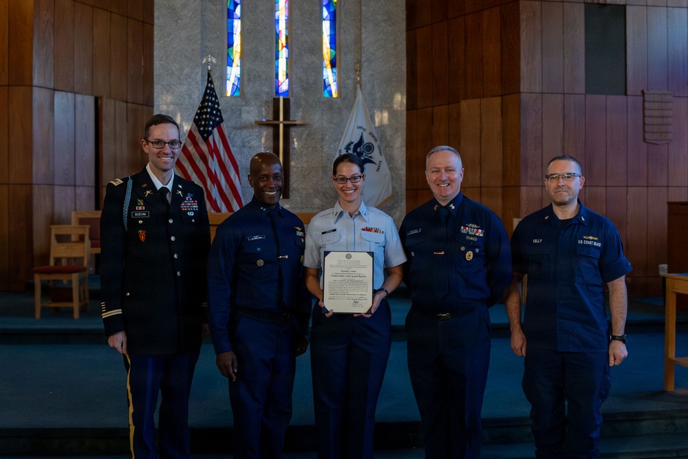 MST1 Alexandra Boehm, a reservist assigned to Sector New York, is meritoriously advanced during an all-hands event.