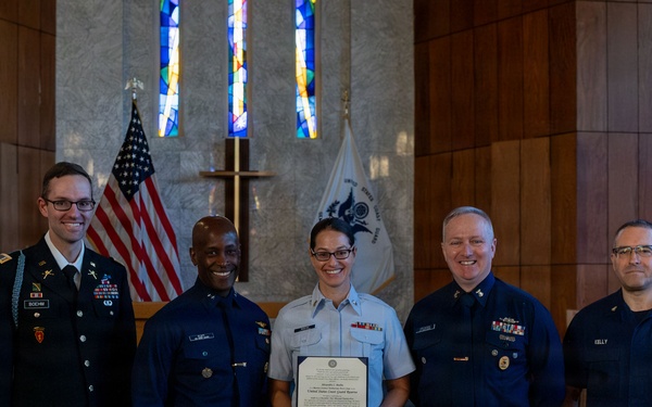 MST1 Alexandra Boehm, a reservist assigned to Sector New York, is meritoriously advanced during an all-hands event.