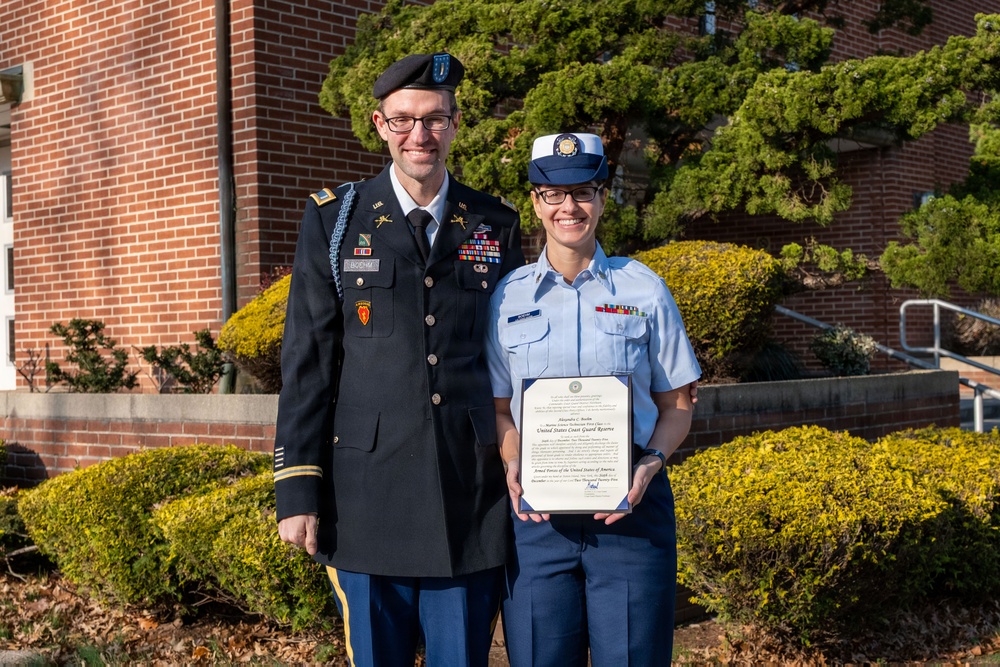 MST1 Alexandra Boehm, a reservist assigned to Sector New York, is meritoriously advanced during an all-hands event.