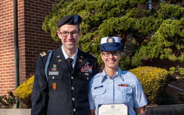 MST1 Alexandra Boehm, a reservist assigned to Sector New York, is meritoriously advanced during an all-hands event.