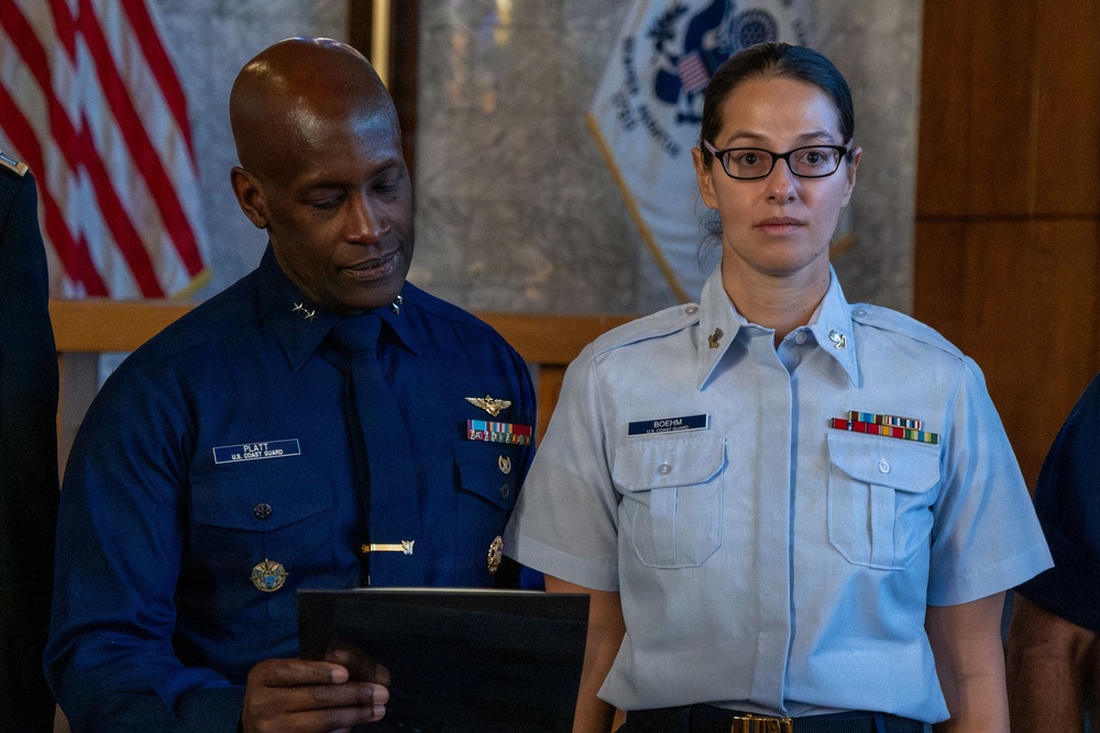 MST1 Alexandra Boehm, a reservist assigned to Sector New York, is meritoriously advanced during an all-hands event.