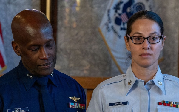 MST1 Alexandra Boehm, a reservist assigned to Sector New York, is meritoriously advanced during an all-hands event.