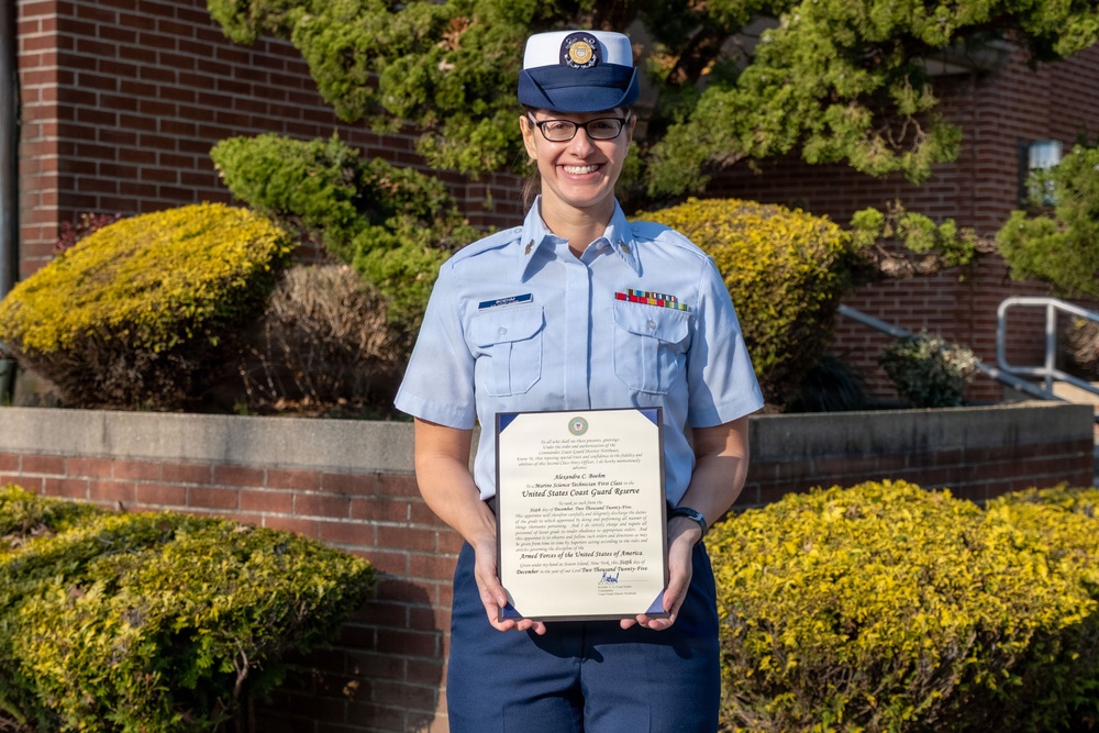 MST1 Alexandra Boehm, a reservist assigned to Sector New York, is meritoriously advanced during an all-hands event.