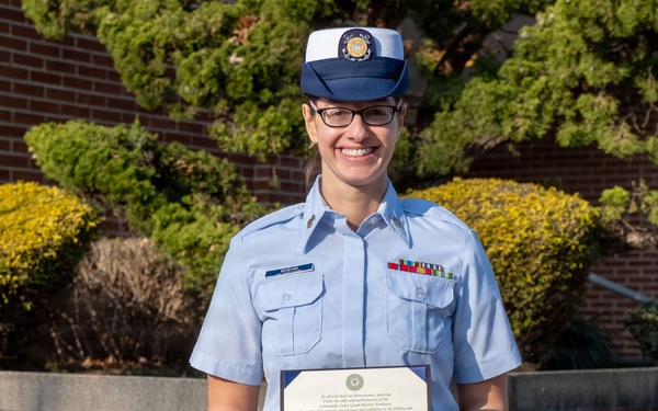 MST1 Alexandra Boehm, a reservist assigned to Sector New York, is meritoriously advanced during an all-hands event.