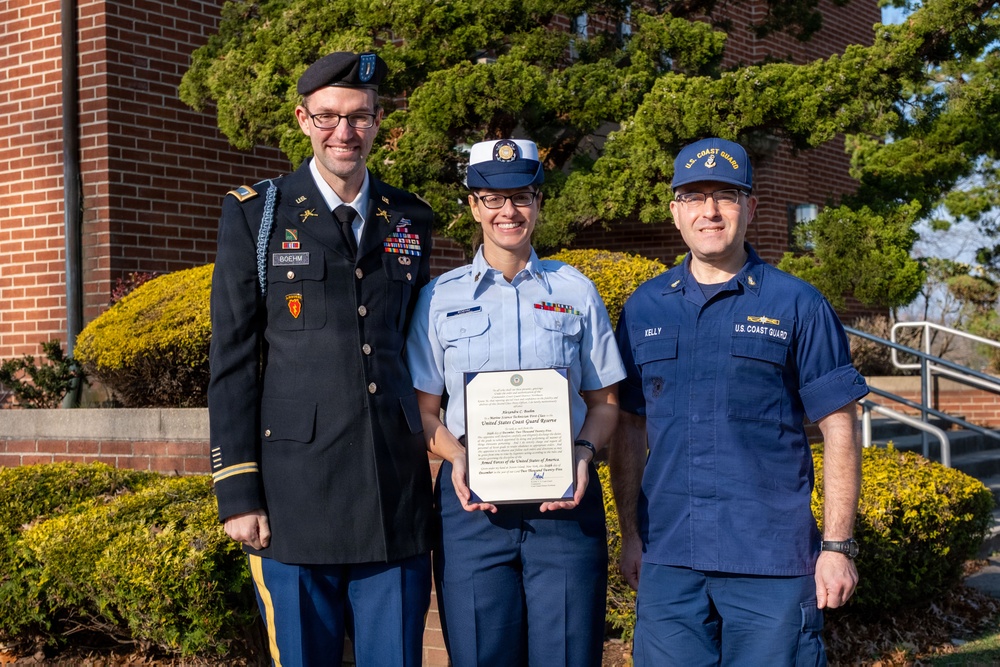 MST1 Alexandra Boehm, a reservist assigned to Sector New York, is meritoriously advanced during an all-hands event.