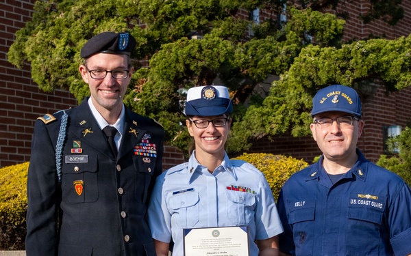 MST1 Alexandra Boehm, a reservist assigned to Sector New York, is meritoriously advanced during an all-hands event.