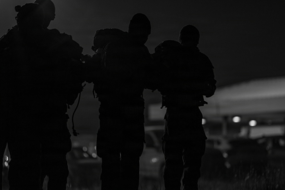 52 EOD Soldiers prepare for the start of the Norwegian foot march.