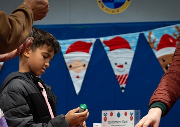 Team Minot celebrates the Minot Air Force Base Christmas Tree Lighting ceremony