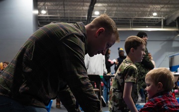 Team Minot celebrates the Minot Air Force Base Christmas Tree Lighting ceremony