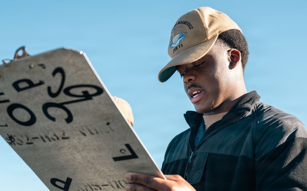 U.S. Navy Sailors Conduct Maintenance on the Flight Deck