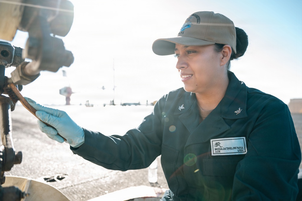 U.S. Navy Sailors Conduct Maintenance on the Flight Deck