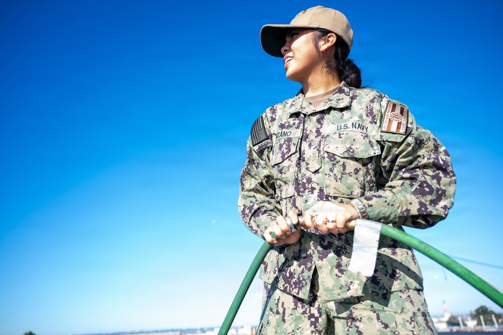 U.S. Navy Sailors Conduct Maintenance on the Flight Deck