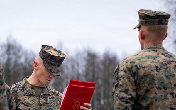 Two U.S. Navy Sailors awarded Fleet Marine Force pin and two Marines promote to Corporal while deployed