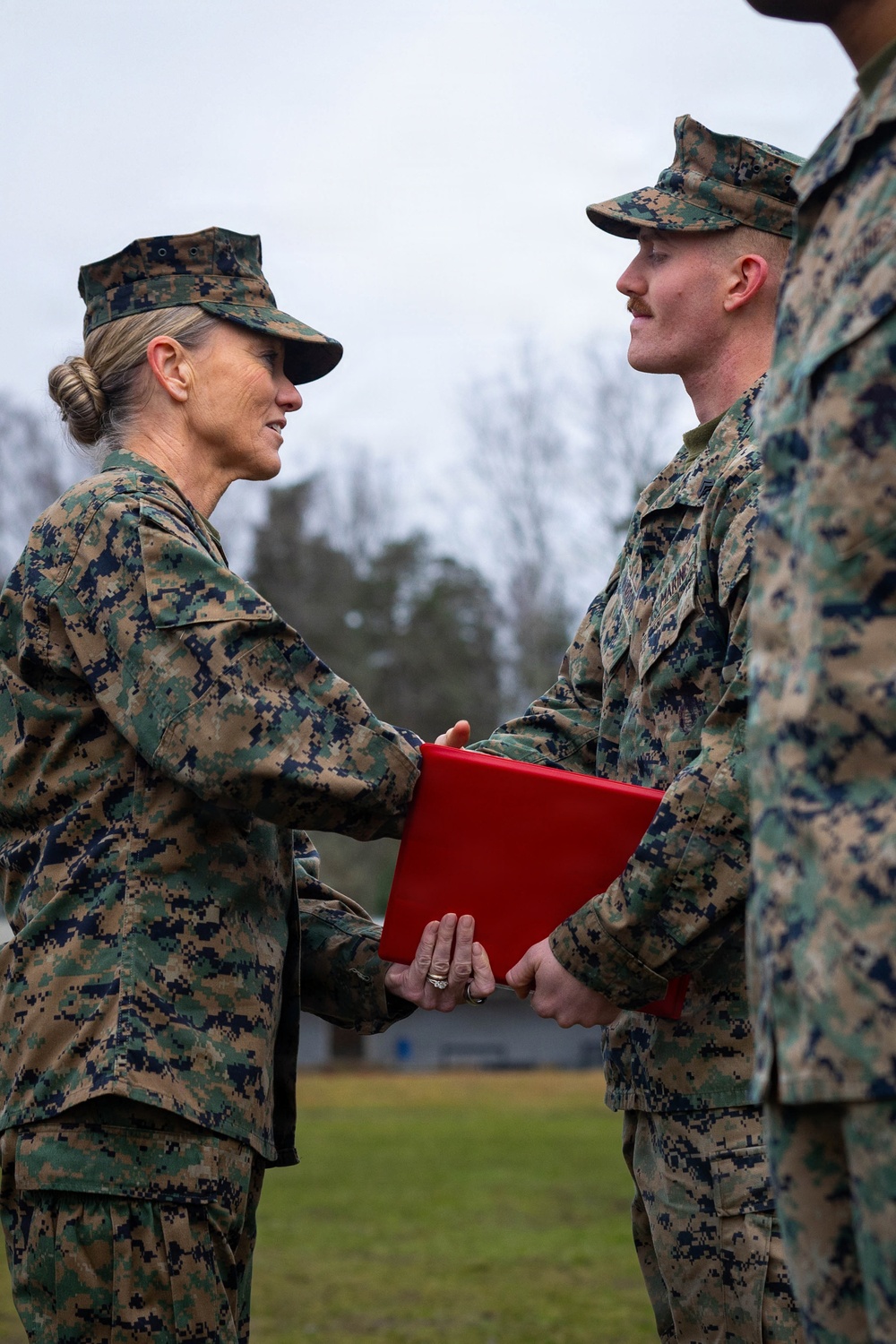 Two U.S. Navy Sailors awarded Fleet Marine Force pin and two Marines promote to Corporal while deployed