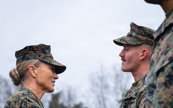 Two U.S. Navy Sailors awarded Fleet Marine Force pin and two Marines promote to Corporal while deployed