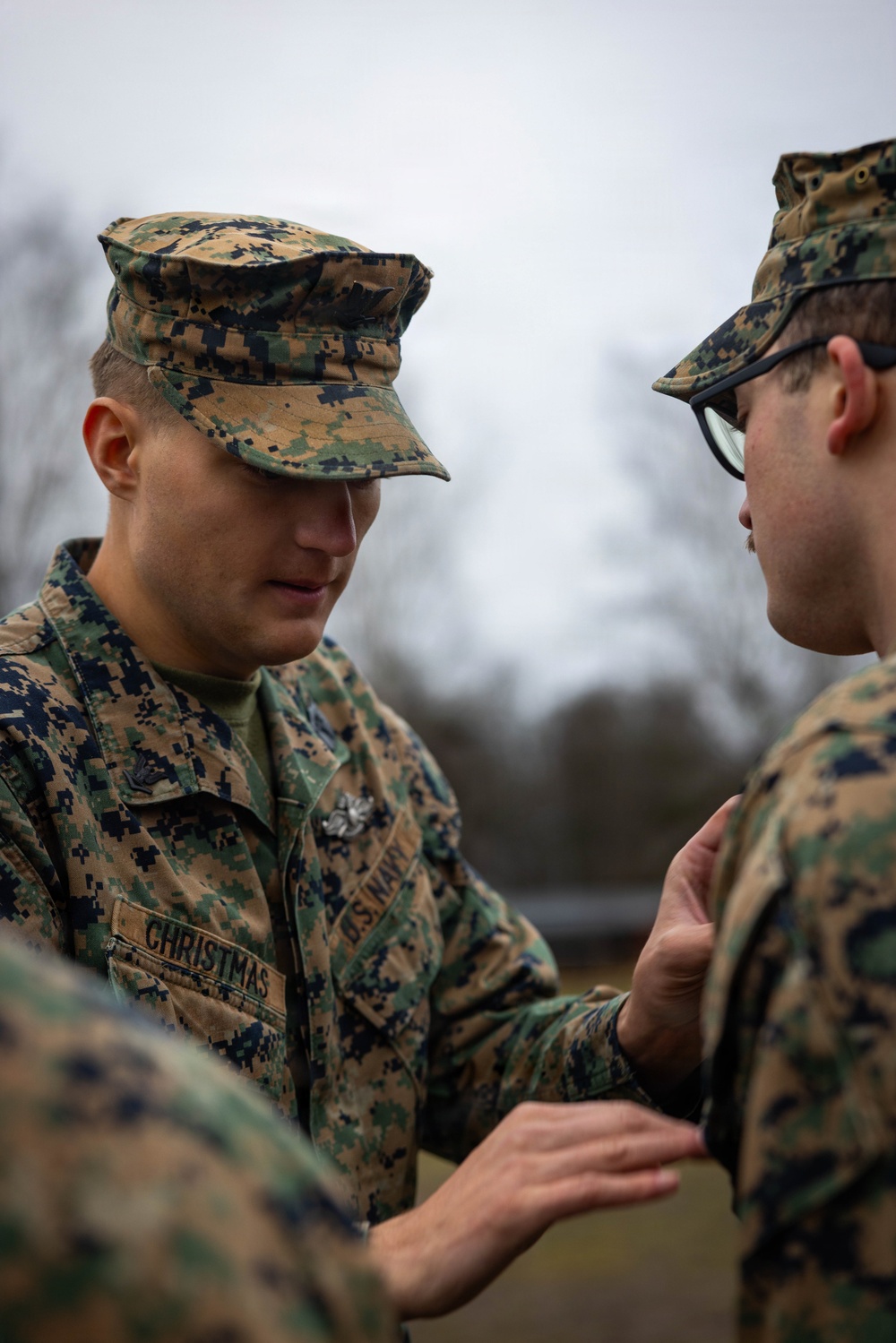 Two U.S. Navy Sailors awarded Fleet Marine Force pin and two Marines promote to Corporal while deployed