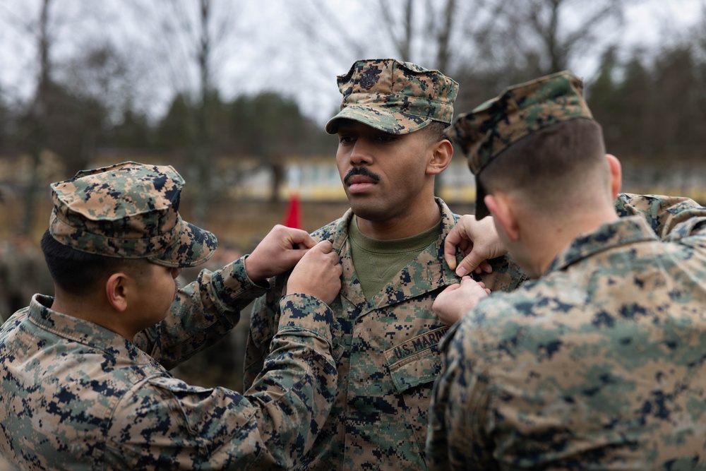 Two U.S. Navy Sailors awarded Fleet Marine Force pin and two Marines promote to Corporal while deployed
