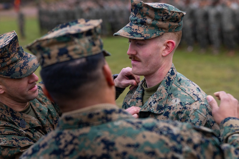 Two U.S. Navy Sailors awarded Fleet Marine Force pin and two Marines promote to Corporal while deployed