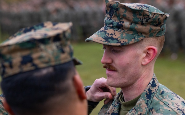 Two U.S. Navy Sailors awarded Fleet Marine Force pin and two Marines promote to Corporal while deployed