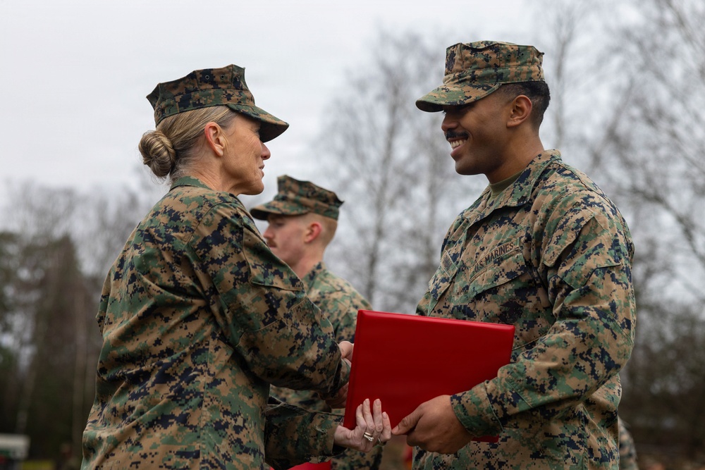 Two U.S. Navy Sailors awarded Fleet Marine Force pin and two Marines promote to Corporal while deployed
