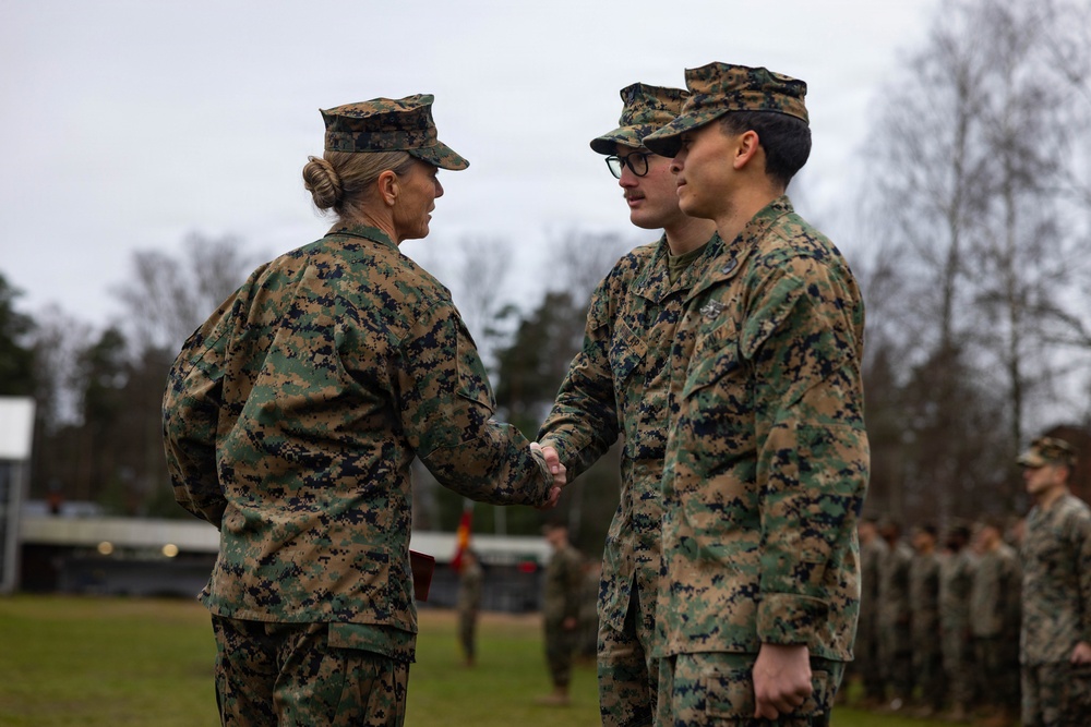 Two U.S. Navy Sailors awarded Fleet Marine Force pin and two Marines promote to Corporal while deployed