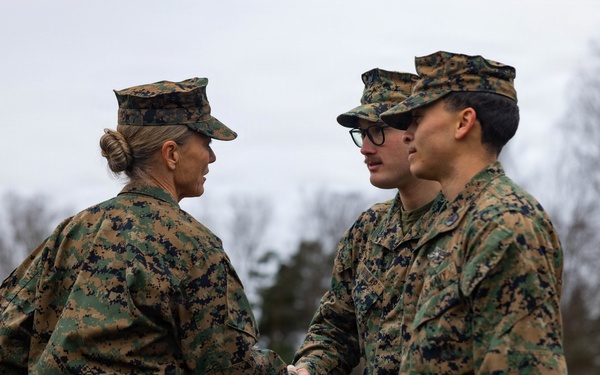 Two U.S. Navy Sailors awarded Fleet Marine Force pin and two Marines promote to Corporal while deployed