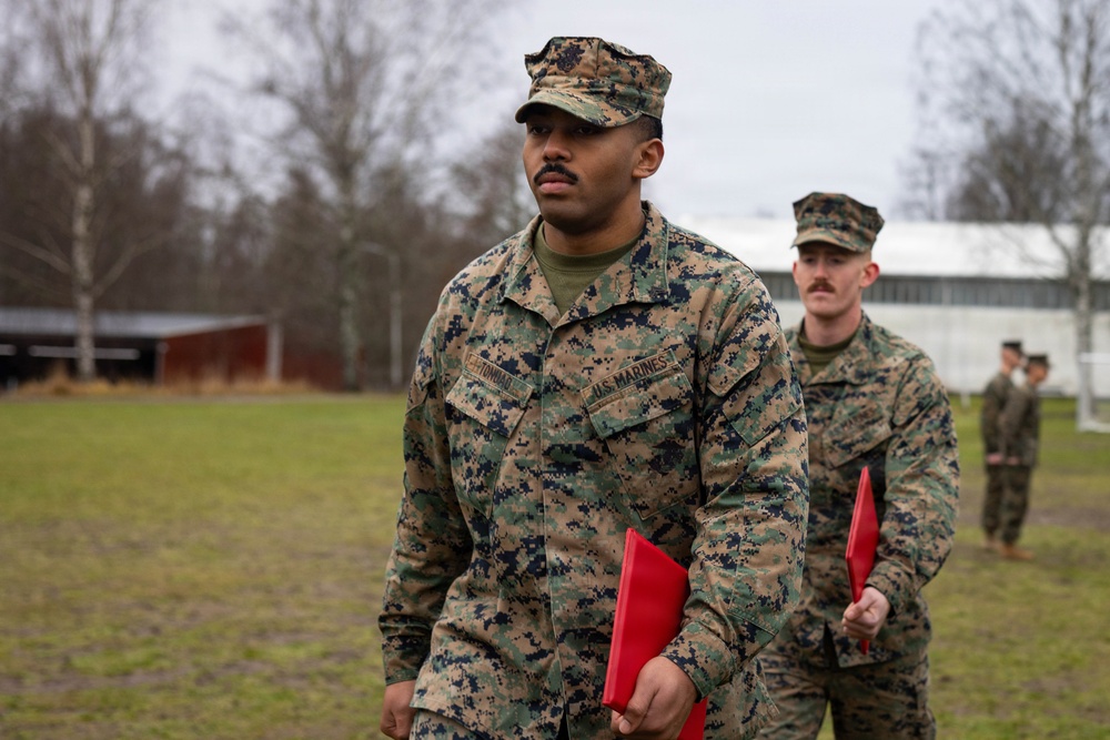 Two U.S. Navy Sailors awarded Fleet Marine Force pin and two Marines promote to Corporal while deployed