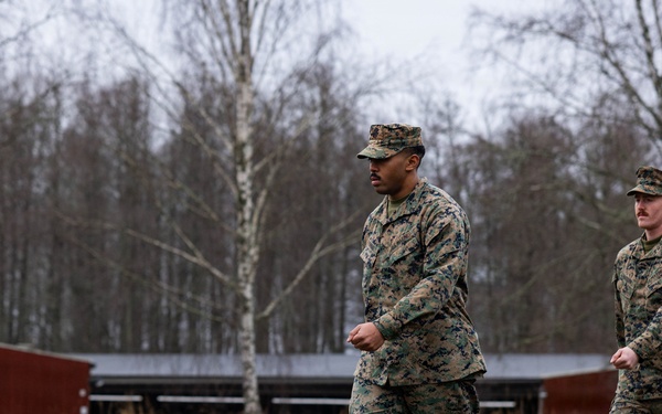 Two U.S. Navy Sailors awarded Fleet Marine Force pin and two Marines promote to Corporal while deployed